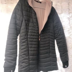 Thigh length, super soft lining puffer coat with thumb holes.